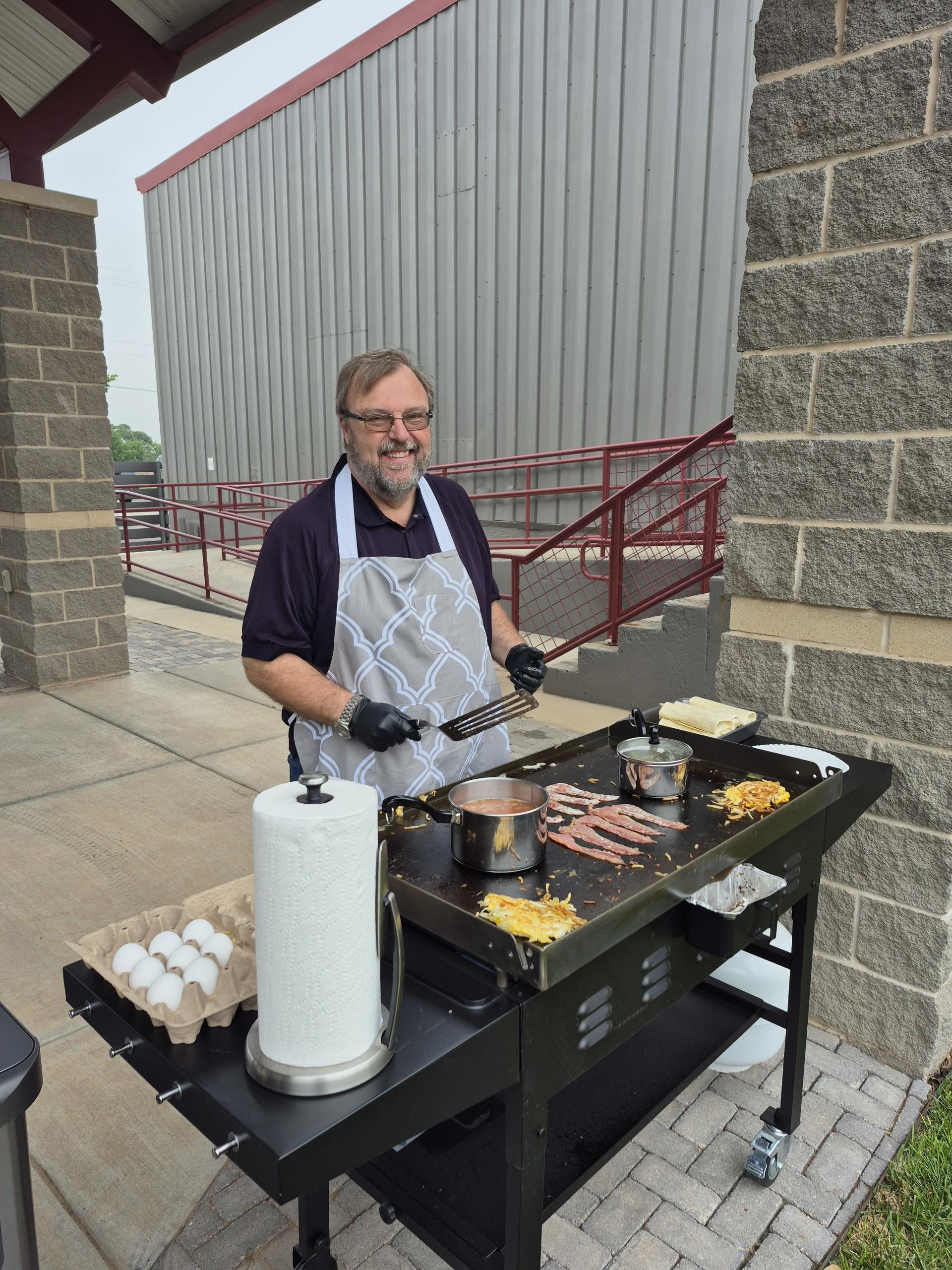 Rich Lyles volunteering in Abilene Texas community event